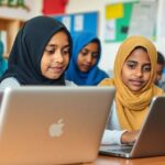 Refugee students focused on digital education in a classroom.