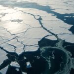 Melting glaciers in a stark landscape, highlighting water security issue.