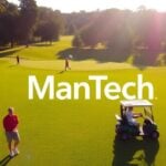 Golf course scene with players and ManTech logo.
