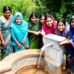 Villagers collecting clean water from a well in Bangladesh.