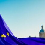 European Union flag waving with iconic landmarks in background.