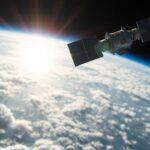 Satellite above Earth for climate adaptation efforts.