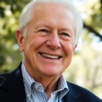 Jimmy Carter smiling in a natural, serene setting.