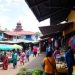 Market scene in Sri Lanka with colorful vendors and architecture.
