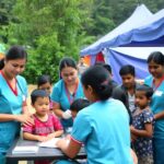 Nurses and children at a health camp in Nepal.