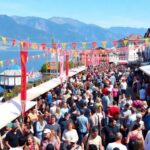 Crowds celebrating by the lake at Montreux 2025.