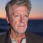 David Lynch in a calm, contemplative pose.