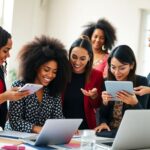 Diverse women entrepreneurs collaborating in a bright workspace.