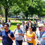 Diverse community engaging in health activities in urban setting.