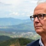Dr. Hans-Dieter Holtzmann portrait in Venezuelan landscape.