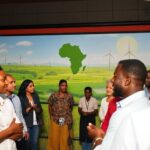 Diverse professionals collaborating at the African Energy Summit.