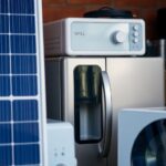 Solar kit next to home appliances on a table.