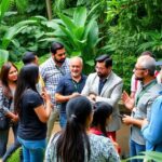 Diverse entrepreneurs collaborating in a green outdoor setting.