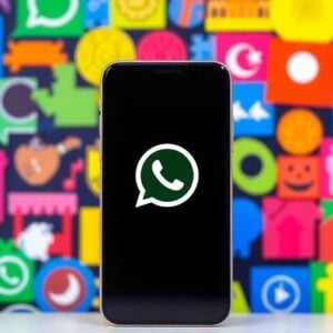 Smartphone with WhatsApp interface and UNESCO icons.