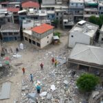 Damaged buildings and rescue teams in earthquake-stricken Nepal.