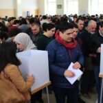 Voters lined up at a polling station during elections.
