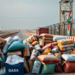 Piled food supplies at a border crossing in Gaza.
