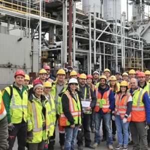 Workers united at Irving Paper amid job cut concerns.