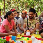 Diverse group collaborating in a vibrant community space.