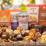 Assorted Canadian chocolates on a rustic wooden table.