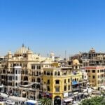 Reconstructed buildings and streets filled with people in Mosul.