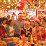 Diverse individuals celebrating together during the holiday season.