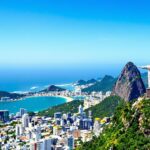 Aerial view of Rio de Janeiro with mountains and beaches.