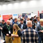 Skilled tradespeople networking at the Unifor conference.