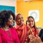 Diverse women discussing gender equality initiatives passionately.