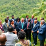 Leaders discussing energy solutions in Barbados' tropical setting.