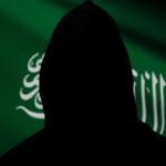 Saudi Arabia flag with executioner's hood.