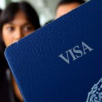 US visa stamp on passport, travel rules tightened.