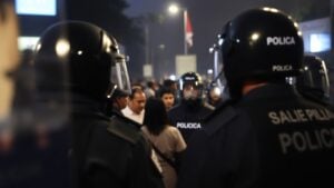 Indonesian police confront protesters during a crackdown.