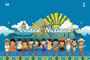 Colorful United Nations banner with diverse children holding hands in front of world landmarks and a sun motif in the background.
