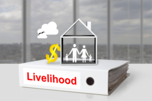 Binder labeled Livelihood with a house silhouette containing a family, a yellow dollar sign, and a cloud above—the image suggests housing and financial security.