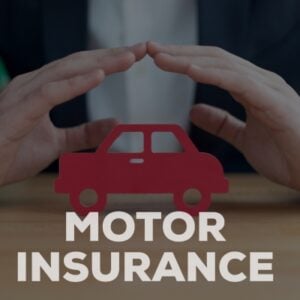 Hands cupped over a red car cutout on a desk with the caption 'Motor Insurance' indicating protection of a vehicle.