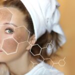 Woman with a towel on her head, touching her face, with a skincare/beauty overlay of hexagonal chemical shapes.