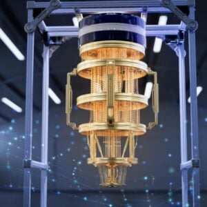 Gold-toned scientific apparatus suspended in a metal frame inside a modern laboratory.