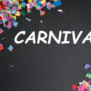 Colorful confetti scattered along the left and bottom edges framing the word CARNIVAL on a dark background, suggesting a festive celebration banner.