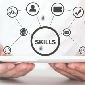 Tablet with a central circle labeled SKILLS connected to icons, representing skill development and networking.